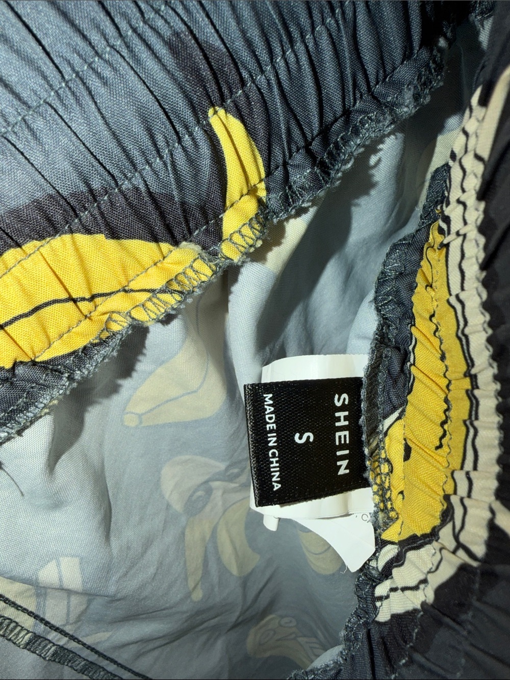 SHEIN Navy Swim Trunks with Yellow Banana Pattern - Picture 2 of 6